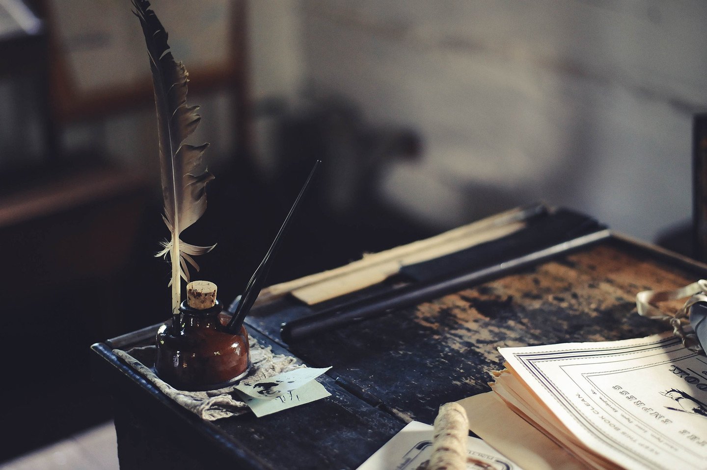 desk with quill with link to blogs page